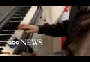 Girl plays piano before evacuating Kharkiv