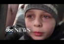 Heartbreaking moment boy says he left his father in Kyiv